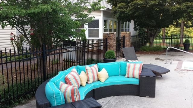 Custom ornamental iron gate in a garden