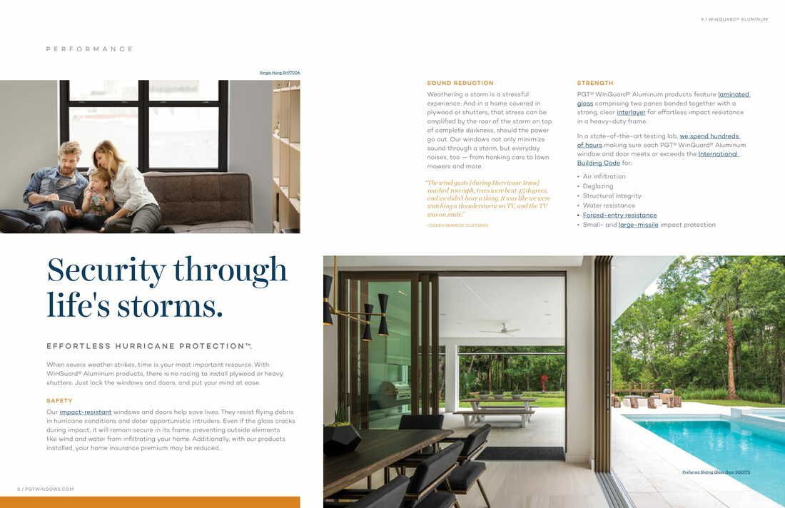 A couple is sitting on a couch in a living room next to a pool.