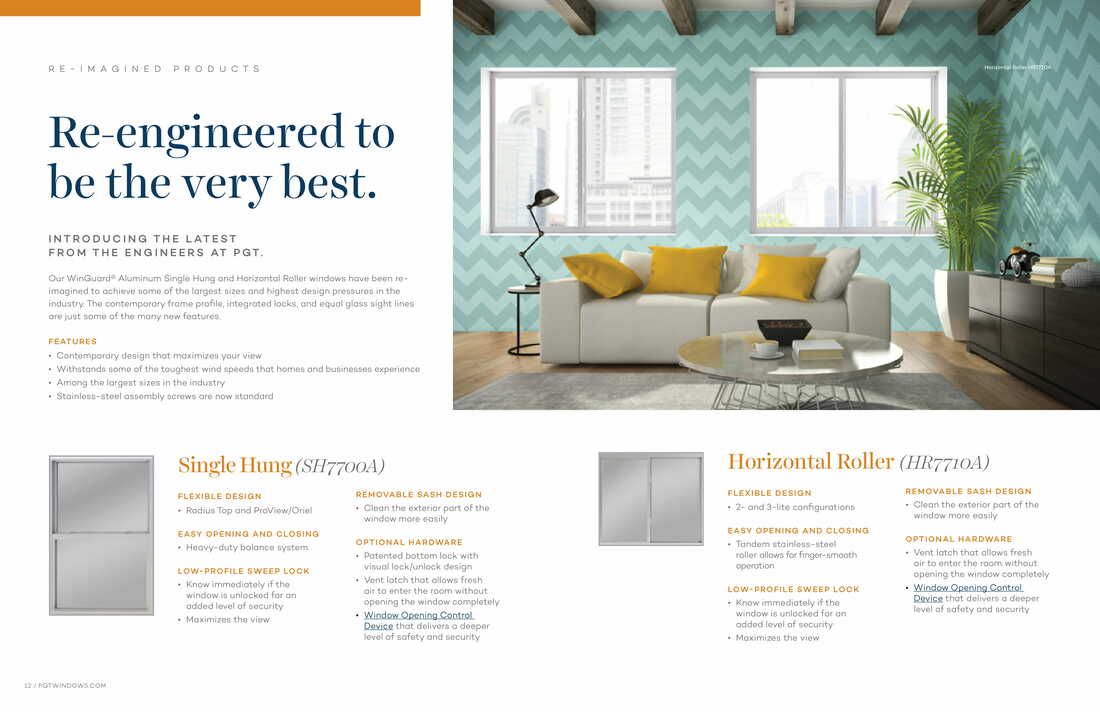 A living room with a white couch, yellow pillows, and a table.