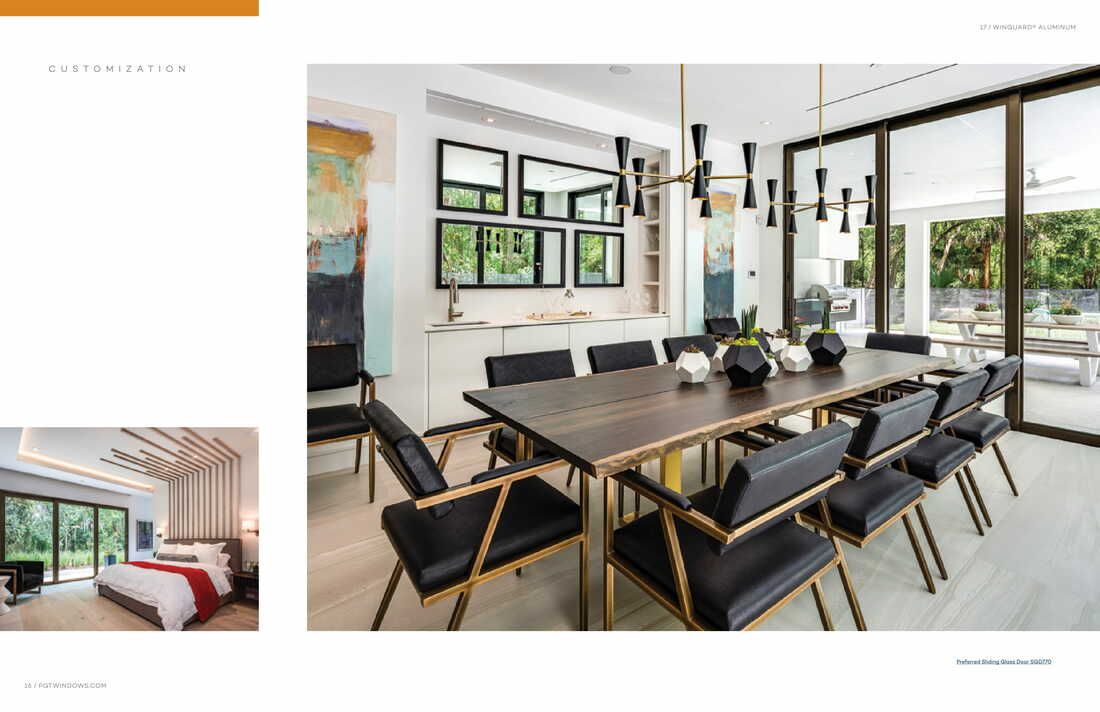 A dining room with a long table and chairs and a bedroom in the background.