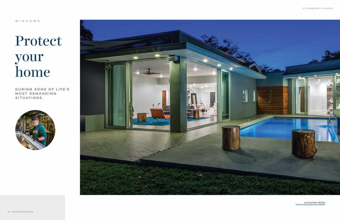 A picture of a house with a pool in the backyard.