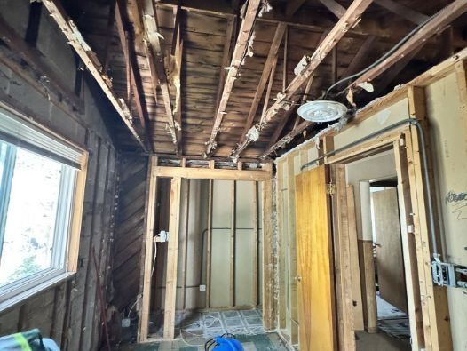 A room with a ceiling that is being remodeled