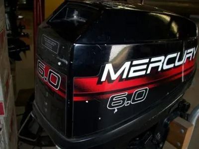Black Mercury 60 outboard motor with red accents on a stand