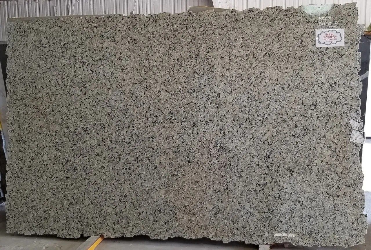 A large piece of granite is sitting on top of a table.