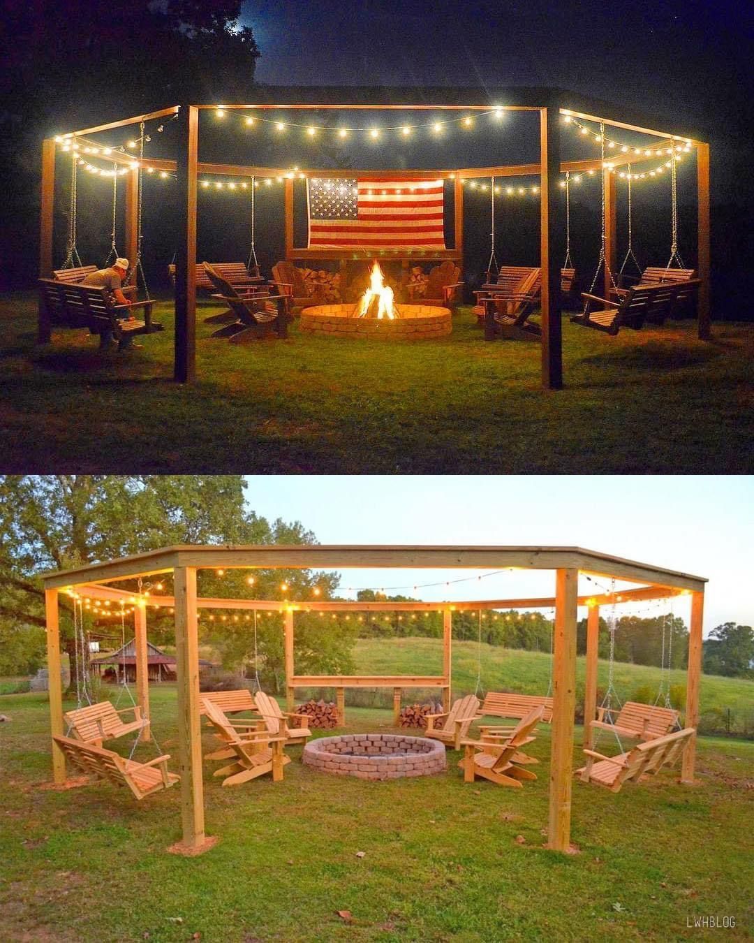 Pergola with swings and fire pit at night, decorated with string lights and an American flag.