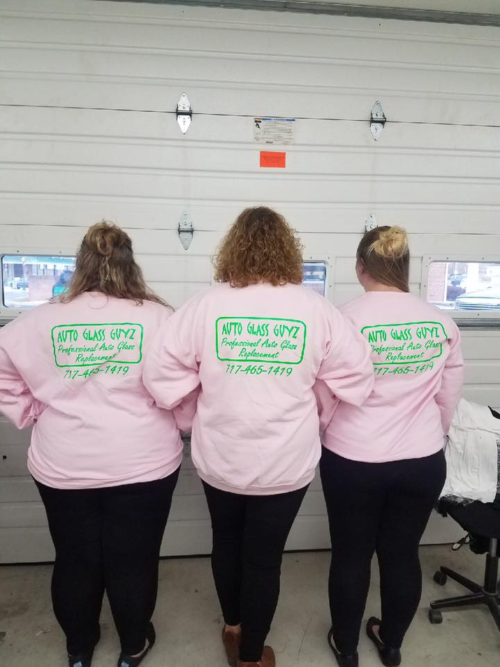 Three woman facing at the back