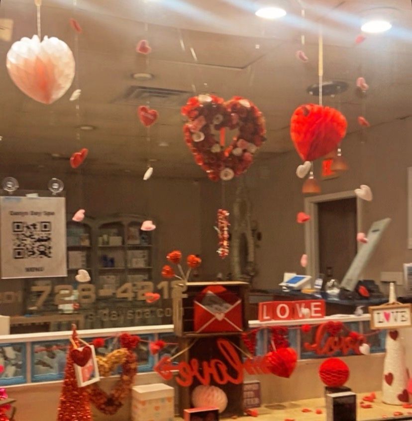 Seasonal Valentines display at Oasys Day Spa, rich reds and heart motifs setting a calm, grounded  celebration of love.   