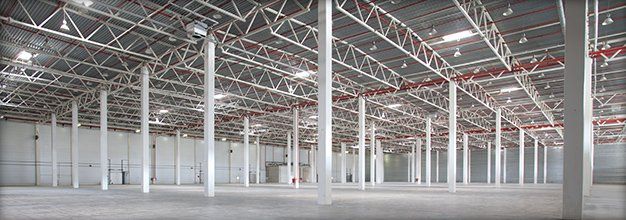 Empty warehouse with open lights