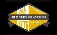 Logo for Berks County Bar Association: gold and black shield with courthouse illustration and text.