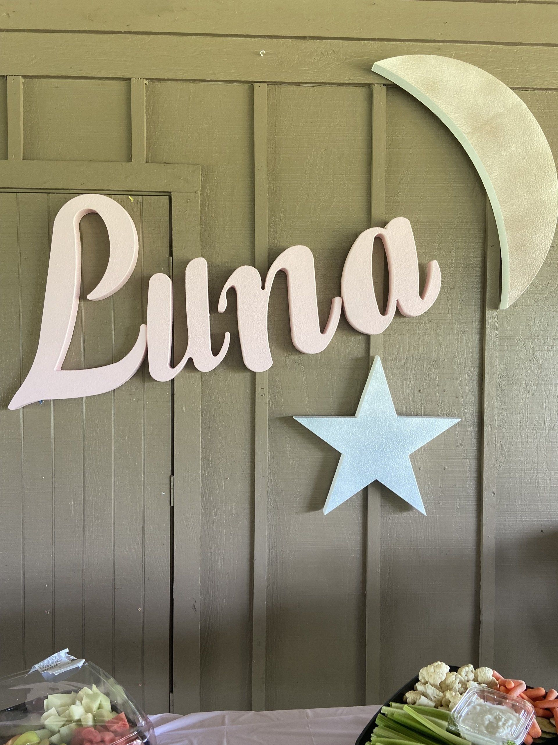 Decorative name display for Luna with a light blue star and crescent moon