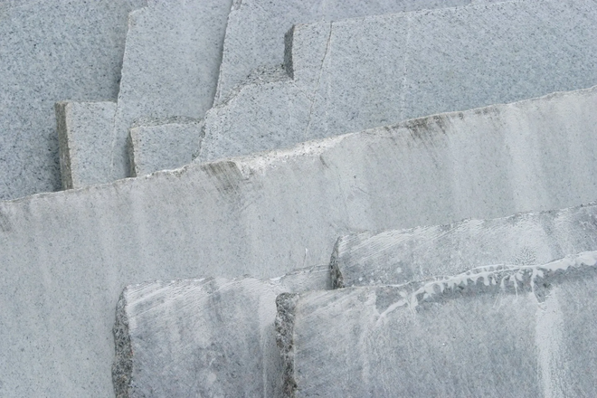 White stone steps with a frosted, snowy surface