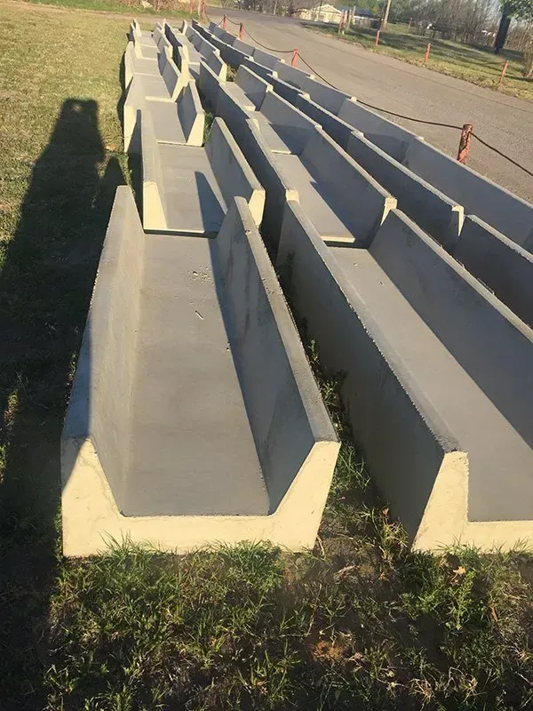 Concrete bleachers in an outdoor park on a sunny day