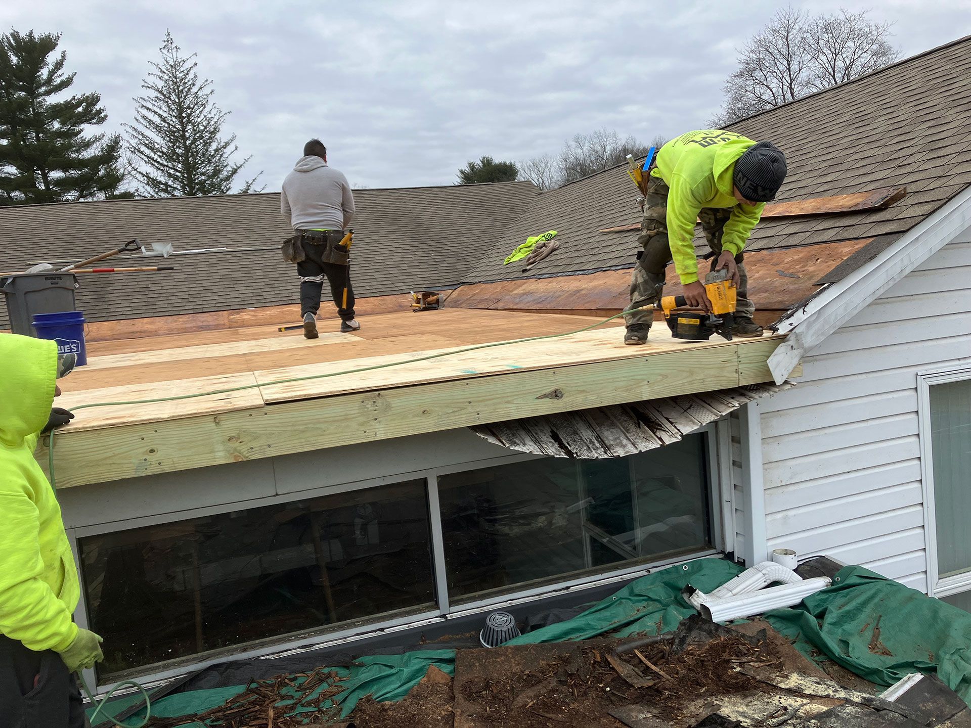 man installing new wood