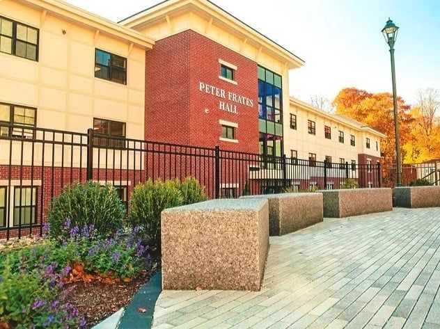 A large building with the name peter smith hall on it
