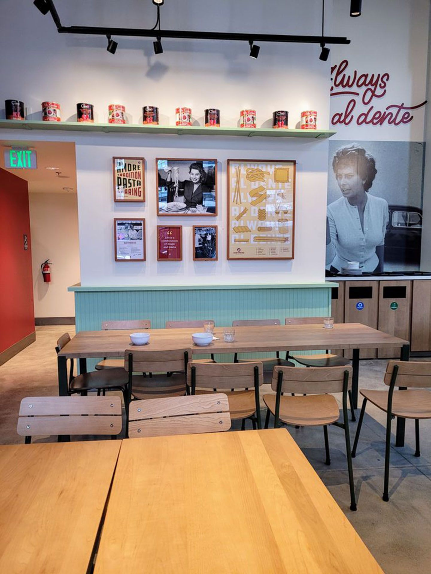 A restaurant with tables and chairs