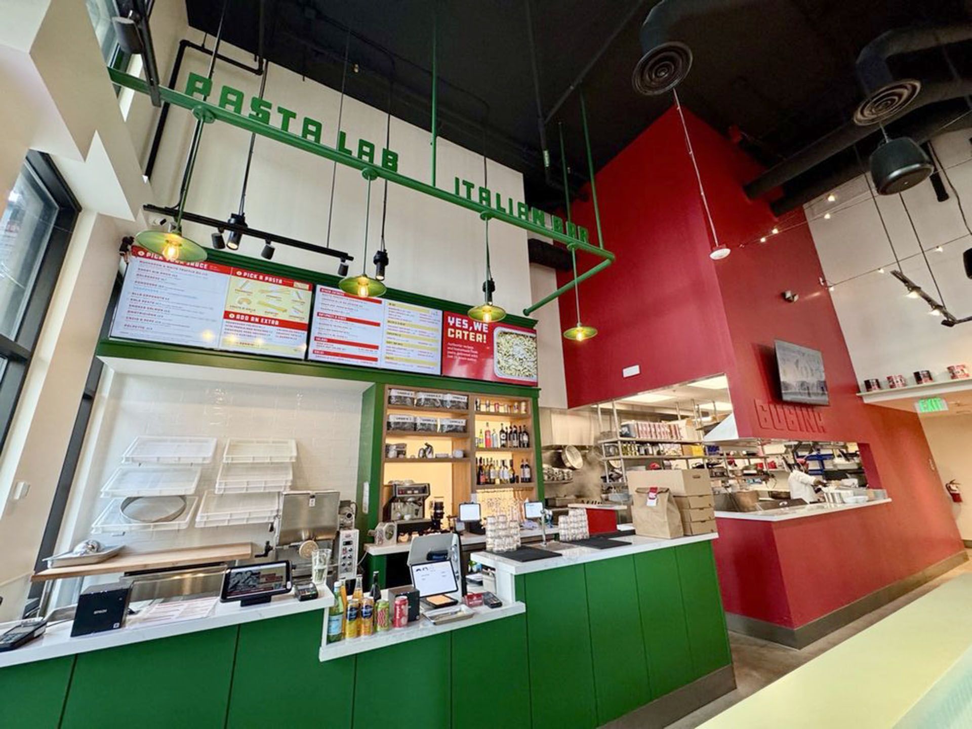 A restaurant with a green counter