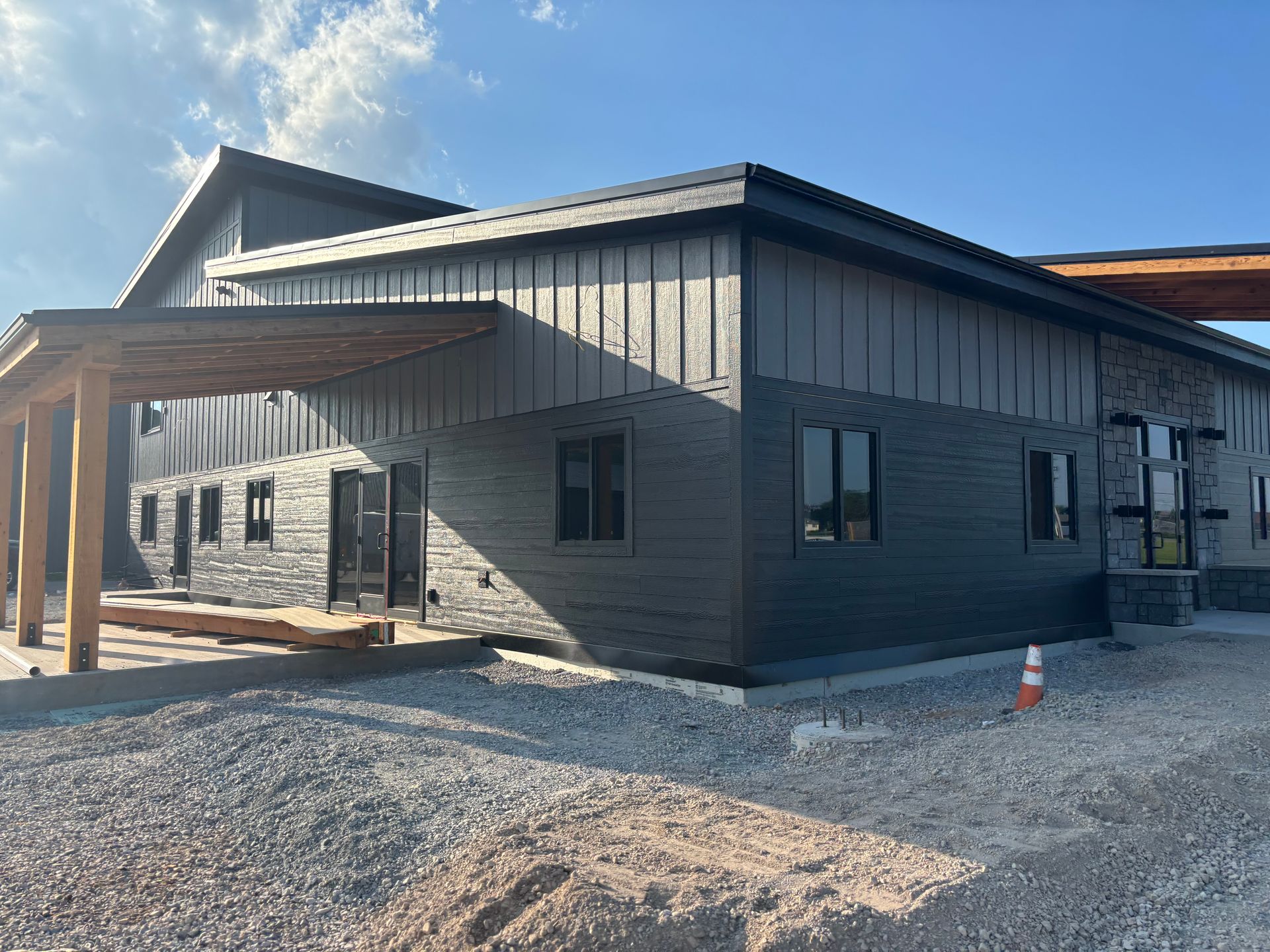 A large building with a lot of windows is being built.