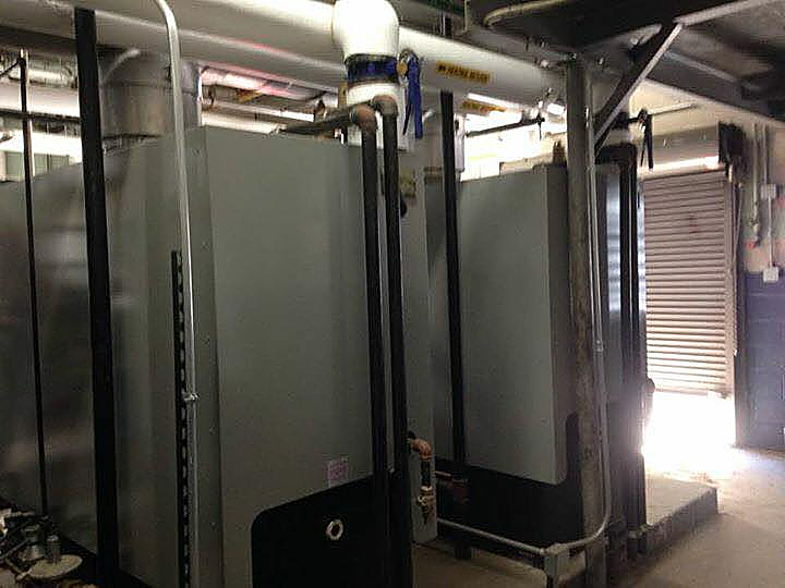 A room with a lot of pipes coming out of it.