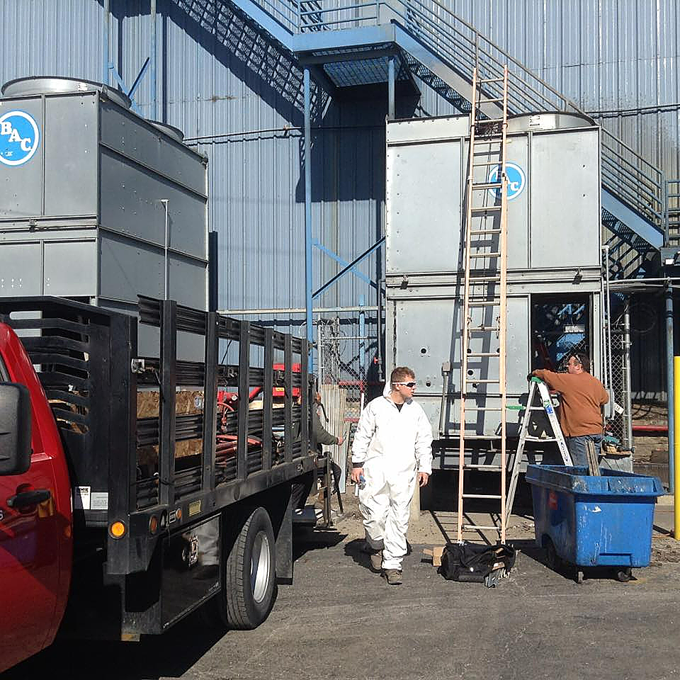 A man walking in front of a tpac building