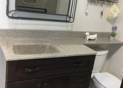 A bathroom sink with a hole in the middle of it.