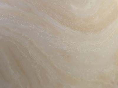 A close up of a tile with a marble texture.