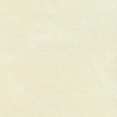 A close up of a white tile with a grainy texture.