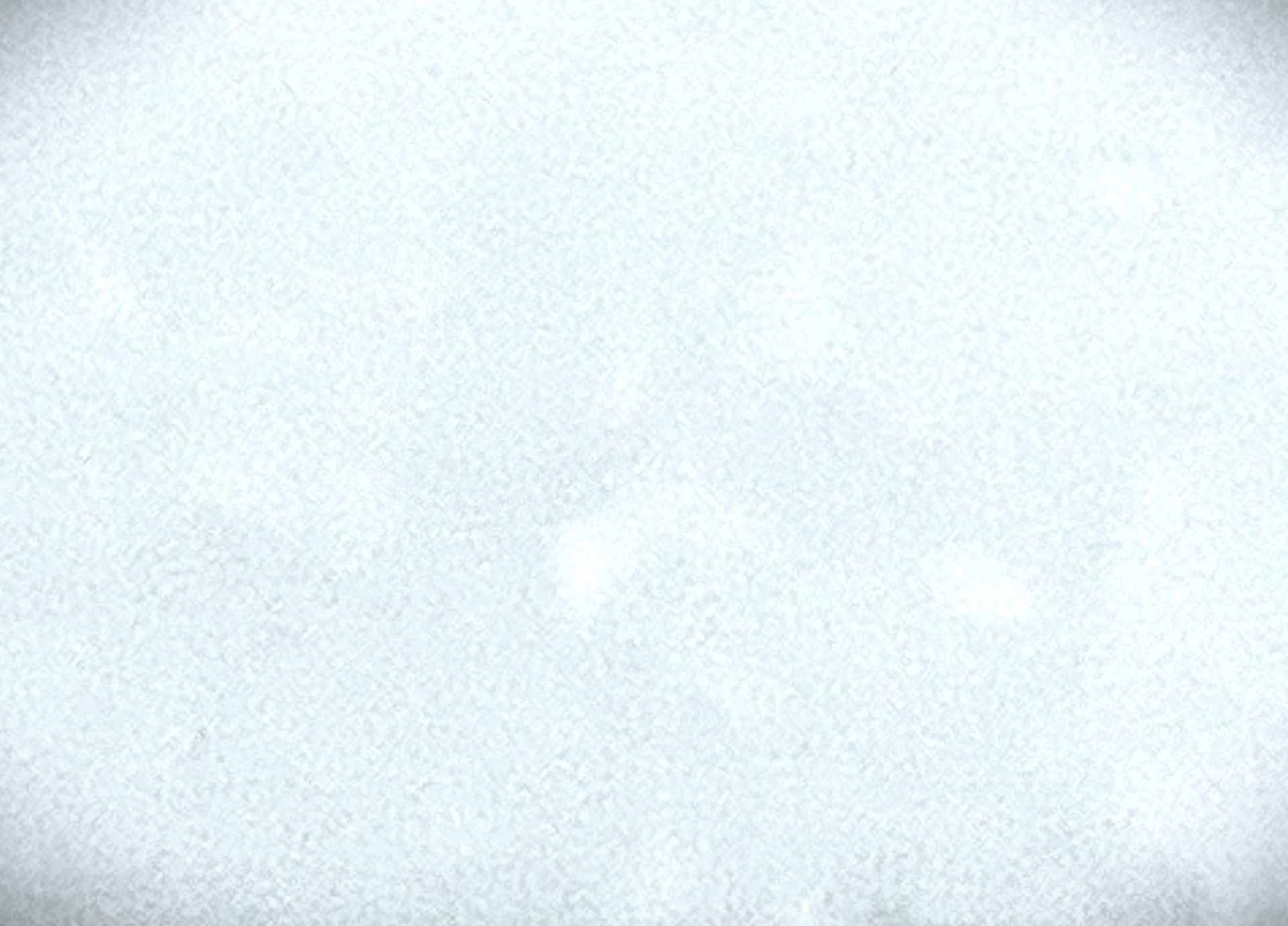 A close up of a white background with a grainy texture.