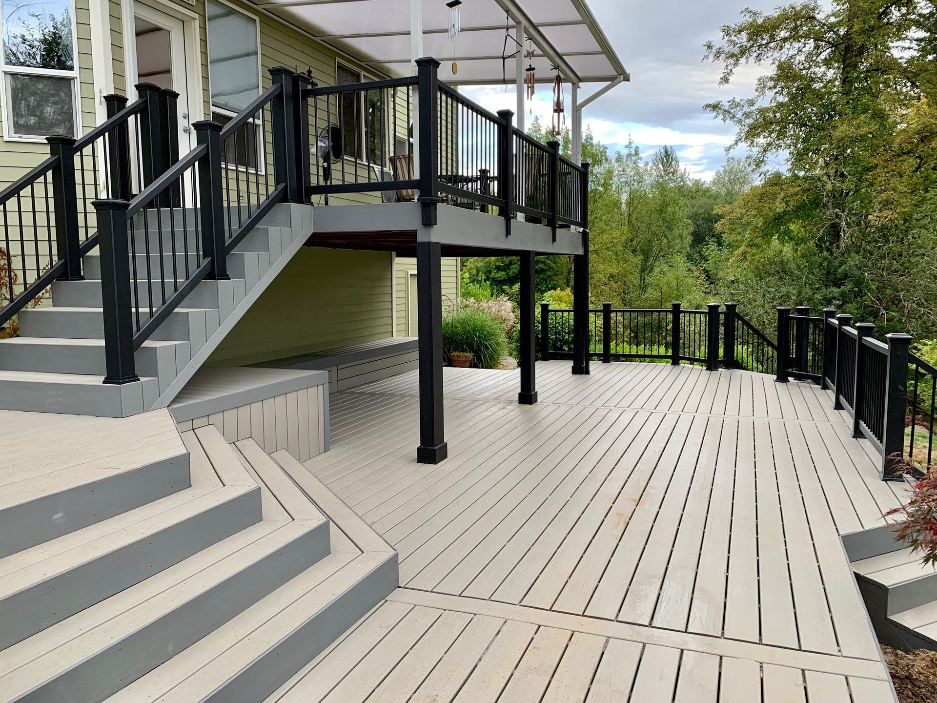A large deck with stairs leading up to it