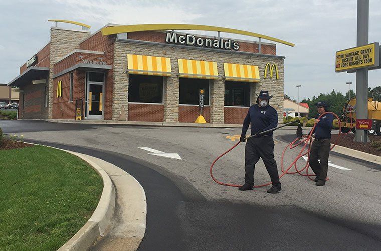 Commercial sealcoating