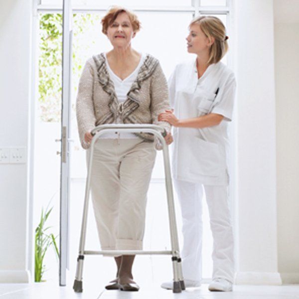 Woman being assisted to walk