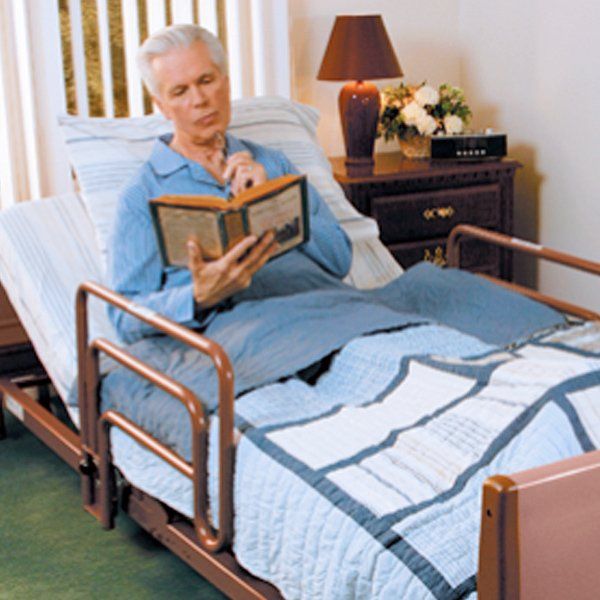 Man lying in hospital bed