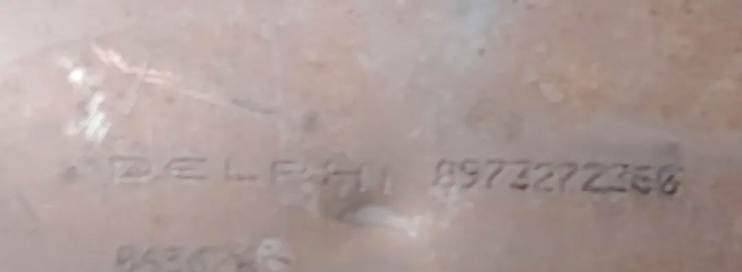 Old scrap metal with embedded numbers