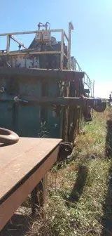 Large industrial machine on a metal platform