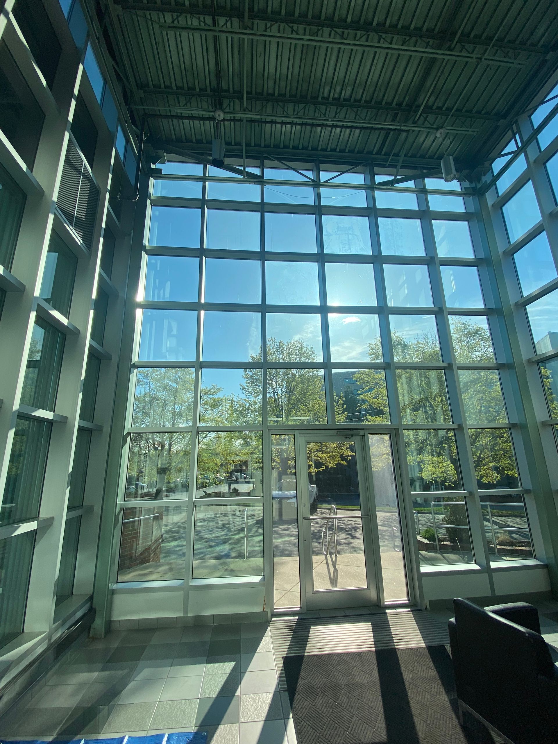 A large building with a lot of windows and doors.