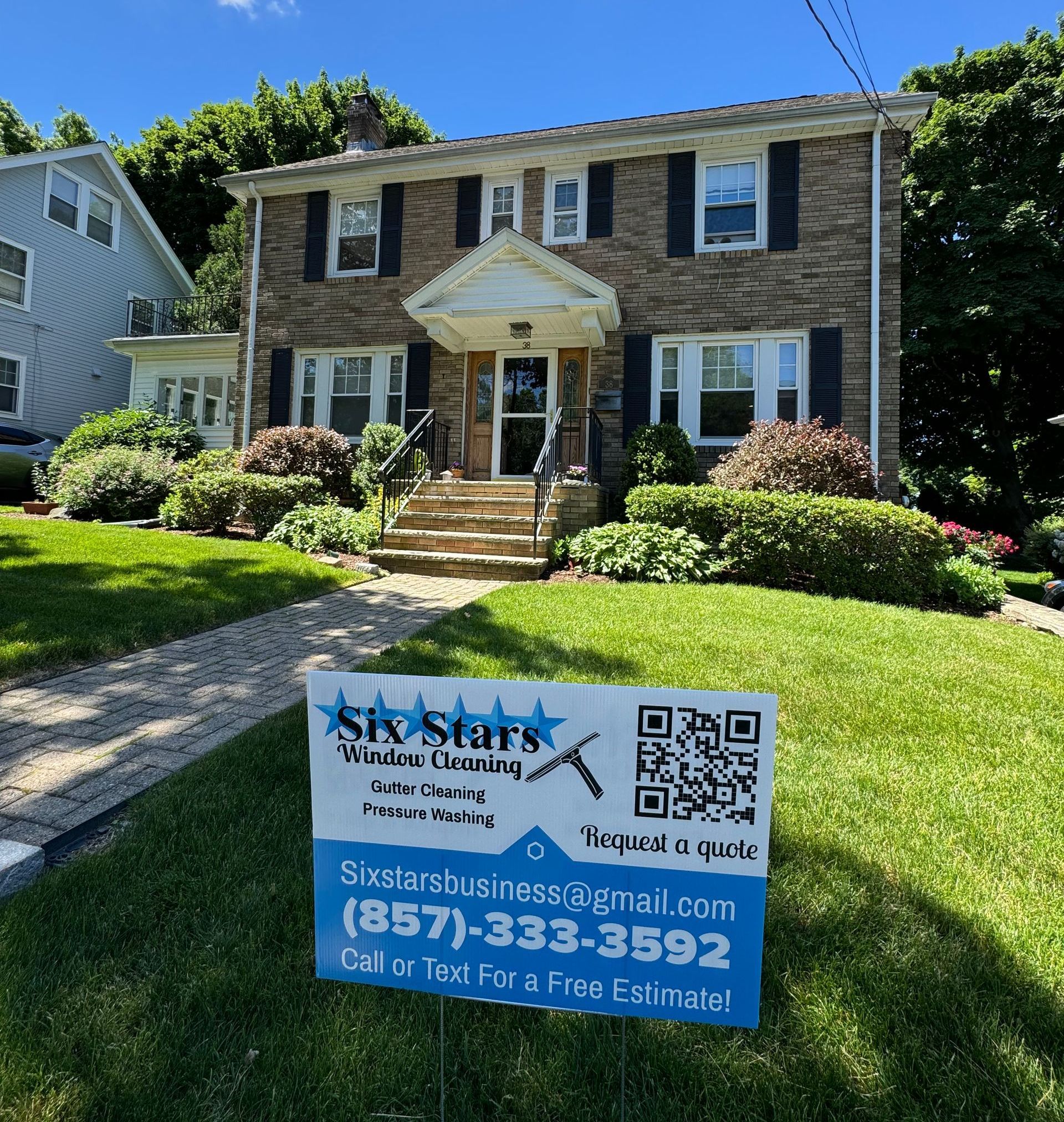 A room with a lot of windows and a bench