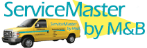 A yellow van that says service master by m & b