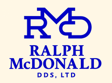 Blue Ralph McDonald DDS, Ltd logo with stylized RM initials