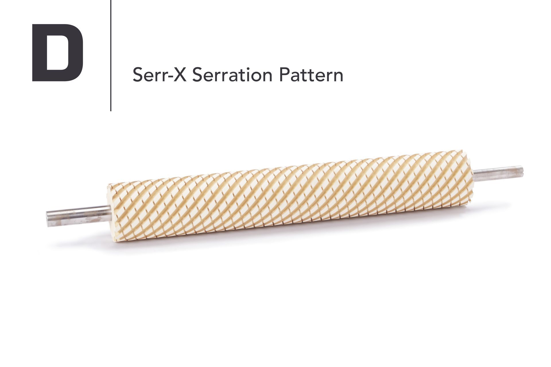 A rolling pin with a pattern on it is sitting on a white surface.