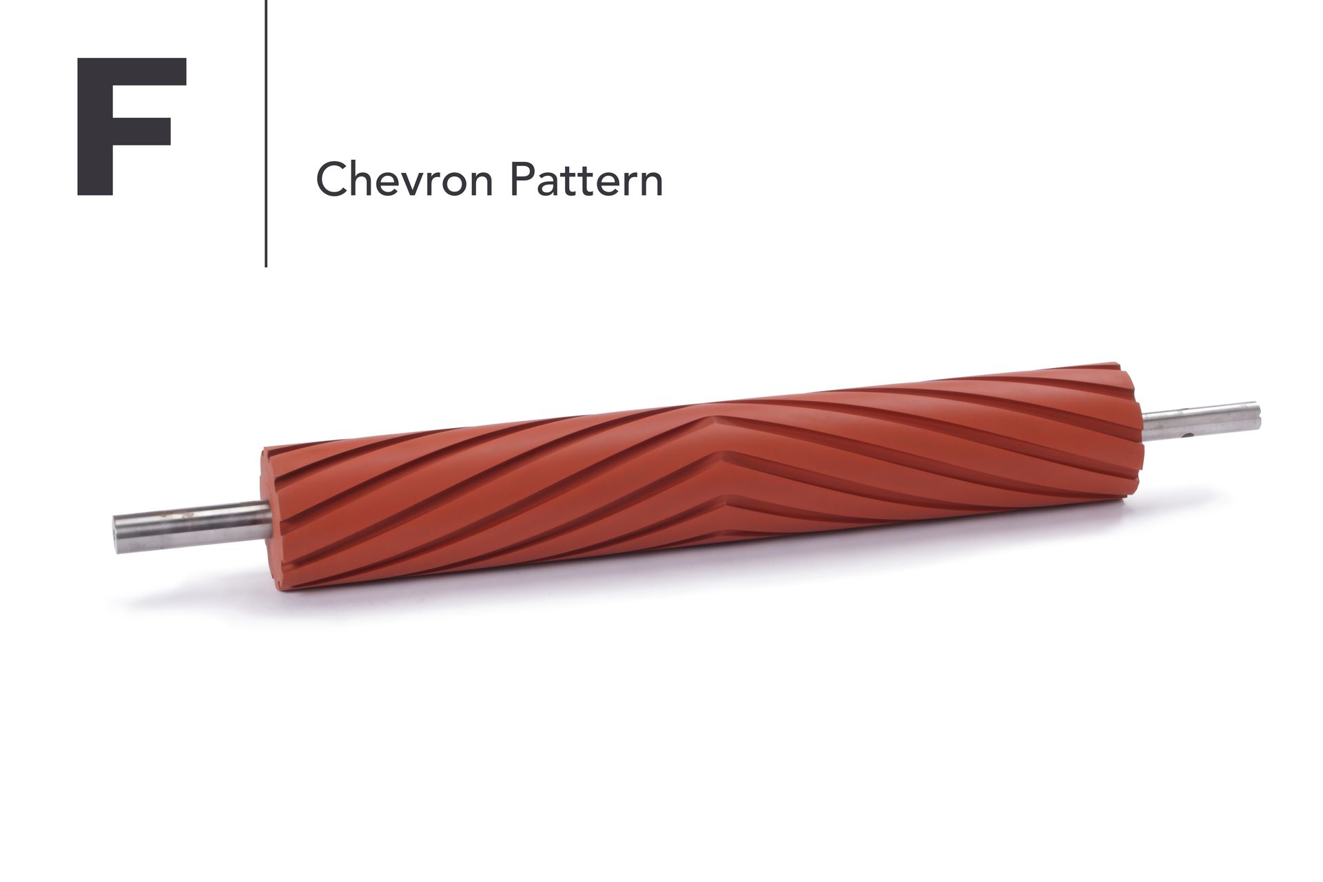 A rubber roller with a chevron pattern on it