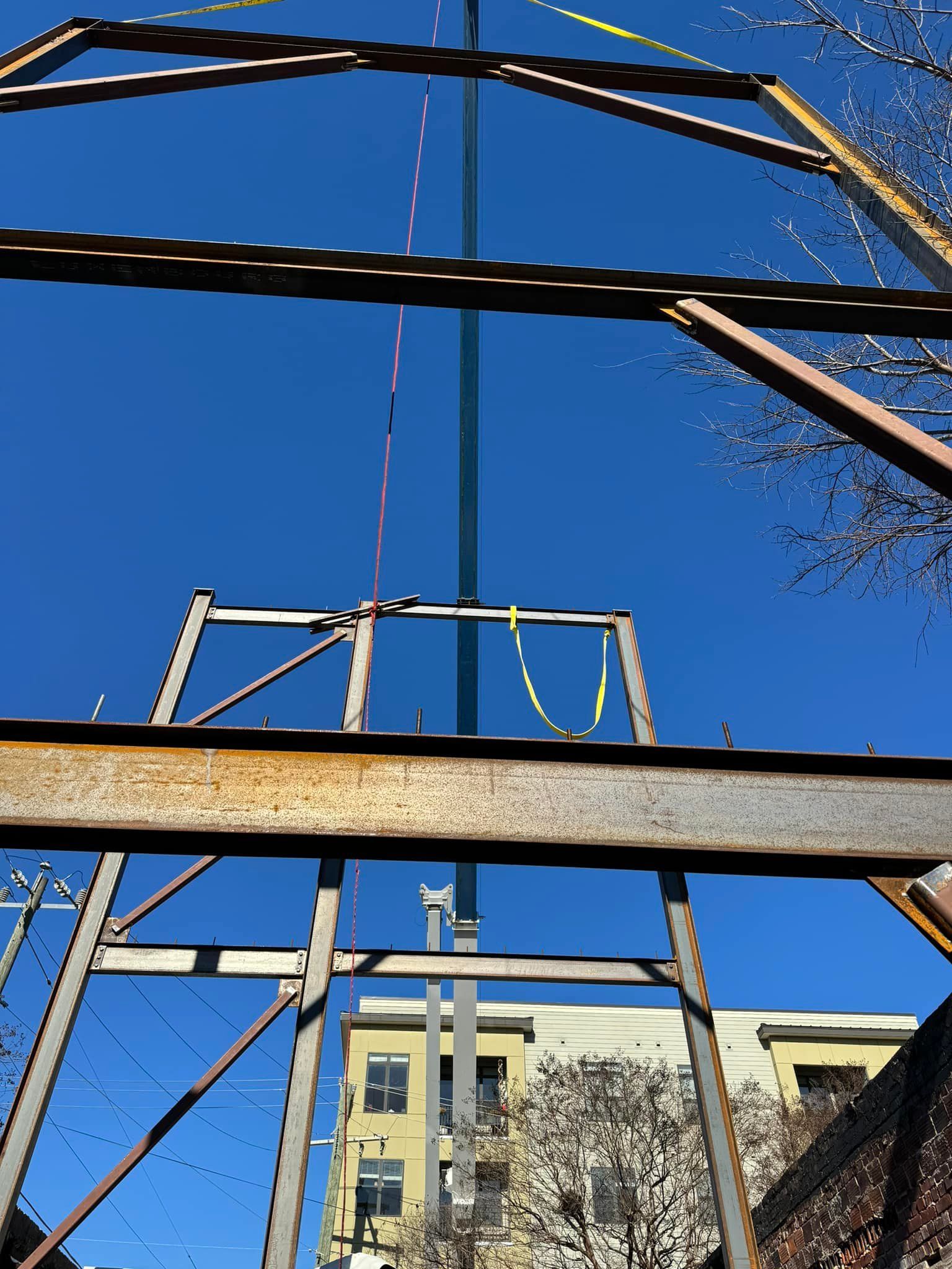 A metal structure with a blue sky in the background