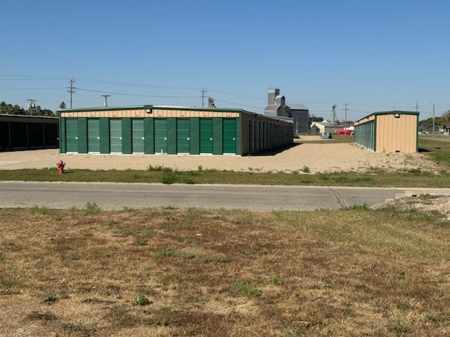 A row of green storage units in Lisbon, ND