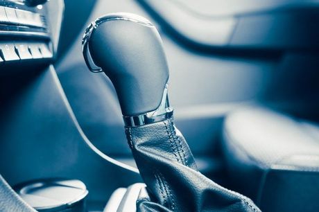 A close up of a shifter in a car