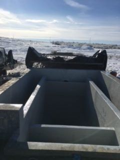 Cement container on a snowy field