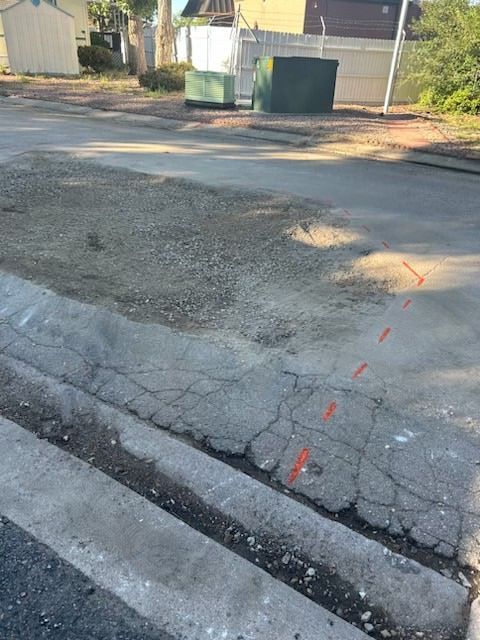 Asphalt patching service before photo