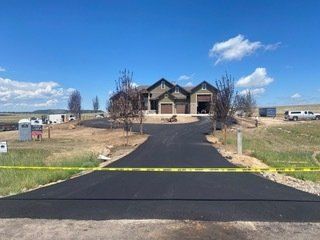 Residential asphalt paving in progress