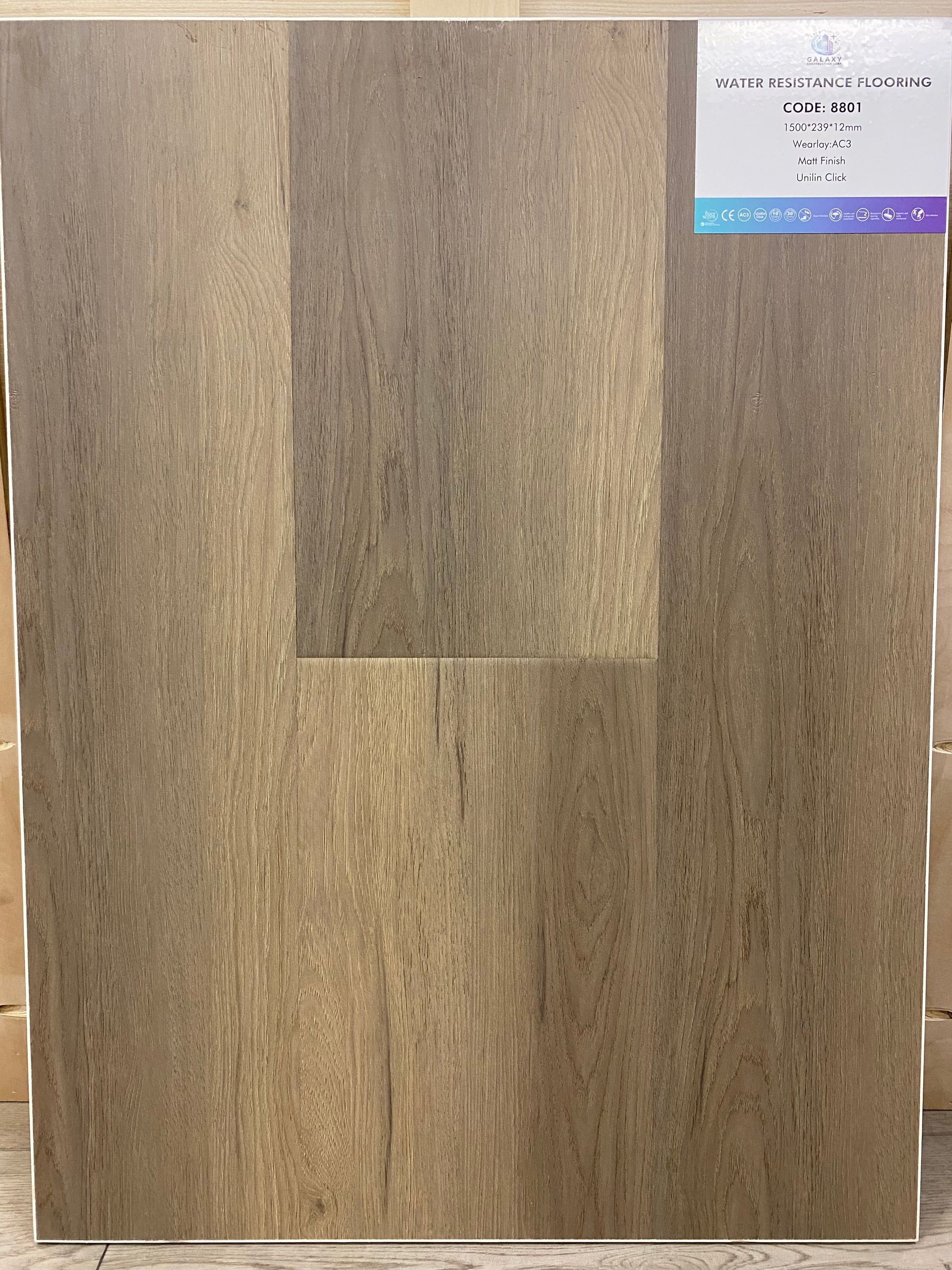 A piece of wood sitting on top of a wooden table.