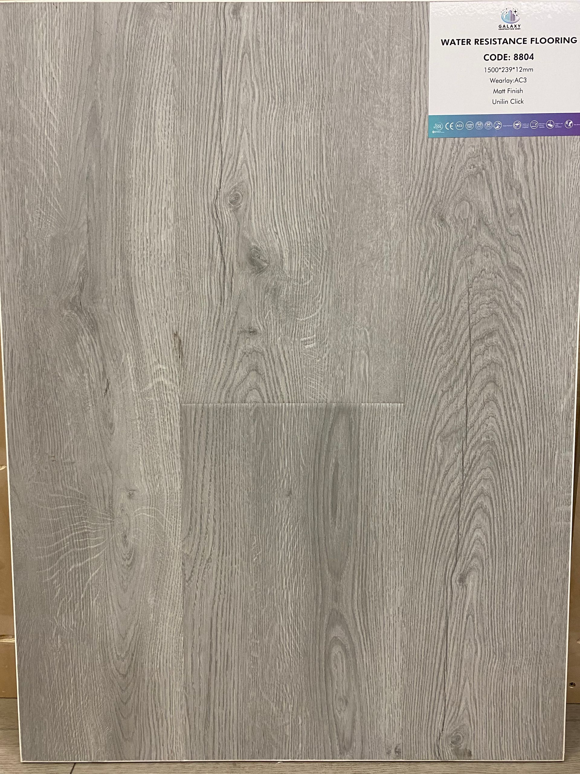 A close up of a piece of wood with a label on it