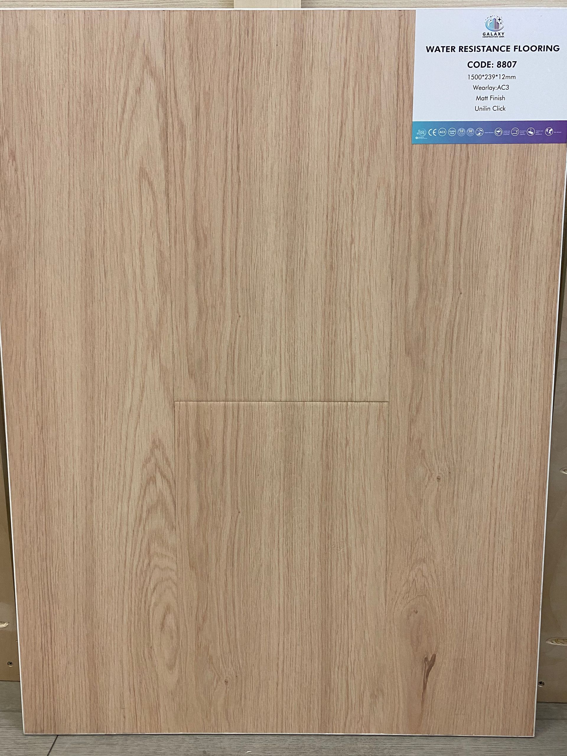 A piece of wood with a label on it