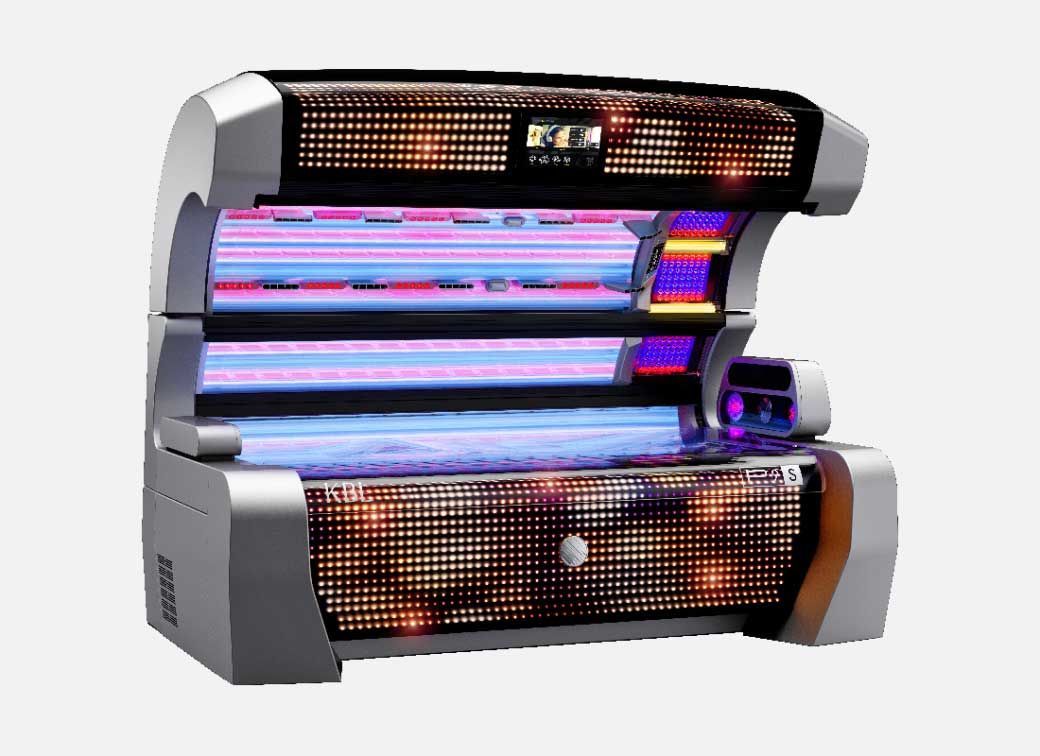 A tanning bed with a silver frame, orange and blue lights, and a mesh design.