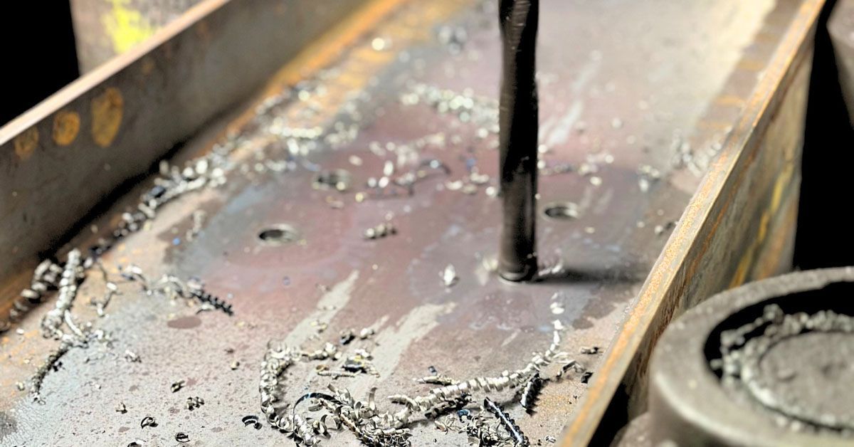 Drilling a hole into a thick metal